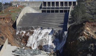 FILE - In this Feb. 28, 2017, file photo, water flows down the Oroville Dam&#39;s crippled spillway in Oroville, Calif. The federal government has rejected $306 million in reimbursements for California&#39;s repair of the nation&#39;s tallest dam, a state agency said Friday, March 8, 2019. That&#39;s just less than half of what California has so far requested from the Federal Emergency Management Agency to repair the Oroville Dam. FEMA has approved $333 million. State water officials put total reconstruction costs at $1.1 billion. (AP Photo/Rich Pedroncelli, File)