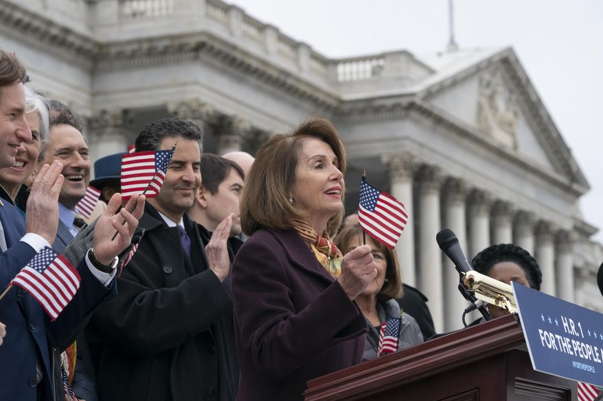 Speaker of the House Nancy Pelosi, D-Calif., and House Democrats rally ahead of passage of H.R. 1, "The For the People Act," at the Capitol in Washington, Friday, March 8, 2019. Rep. John Sarbanes, D-Md., the bill's sponsor, stands behind Pelosi at left. The bill aims to expand voting rights, limit partisan gerrymandering, strengthen ethics rules, and limit the influence of private donor money in politics. (AP Photo/J. Scott Applewhite)