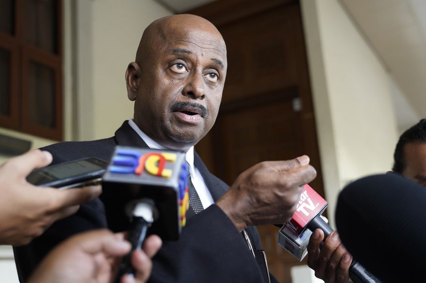 Sankara Nair, lawyer for Ivana Smit's family, speaks to the press at Kuala Lumpur High Court in Kuala Lumpur, Malaysia, Friday, March 8, 2019. A Malaysian coroner has ruled that there was no criminal involvement in the death of an 18-year-old Dutch model whose nude body was found after plunging from a condominium. Ivana Smit's body was found on the balcony of a sixth floor unit in a Kuala Lumpur condominium in December 2017. She was believed to have fallen from the 20th floor where she had spent the night with an American man and his Kazakhstan wife.(AP Photo/Yam G-Jun)