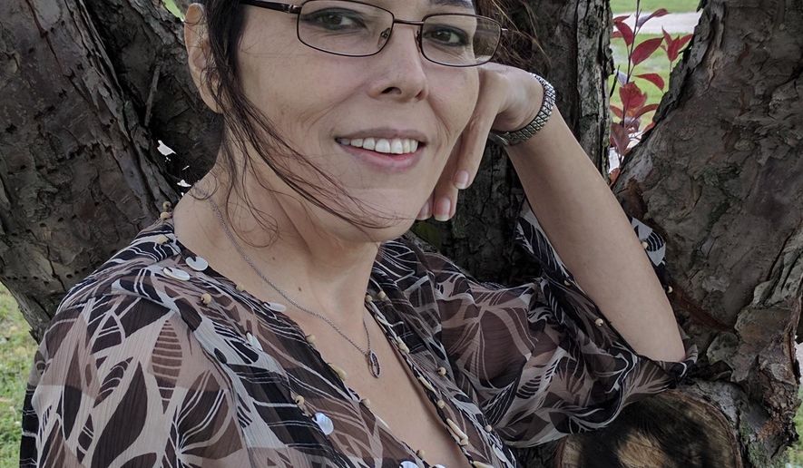 This undated photo provided by ACLU of Iowa shows Carol Ann Beal. The Iowa Supreme Court on Friday, March 8, 2019 upheld a judge’s earlier ruling that found the state cannot deny two transgender women Medicaid coverage for sex reassignment surgery. The ruling comes in the consolidated cases of Beal, 43, and EerieAnna Good, 29,both were born male but have identified as female since childhood and applied to have surgery to their medical providers under the state's Medicaid program. They were denied by the providers, appealed to the state agency, which oversees the program, and were again denied. (ACLU of Iowa via AP)