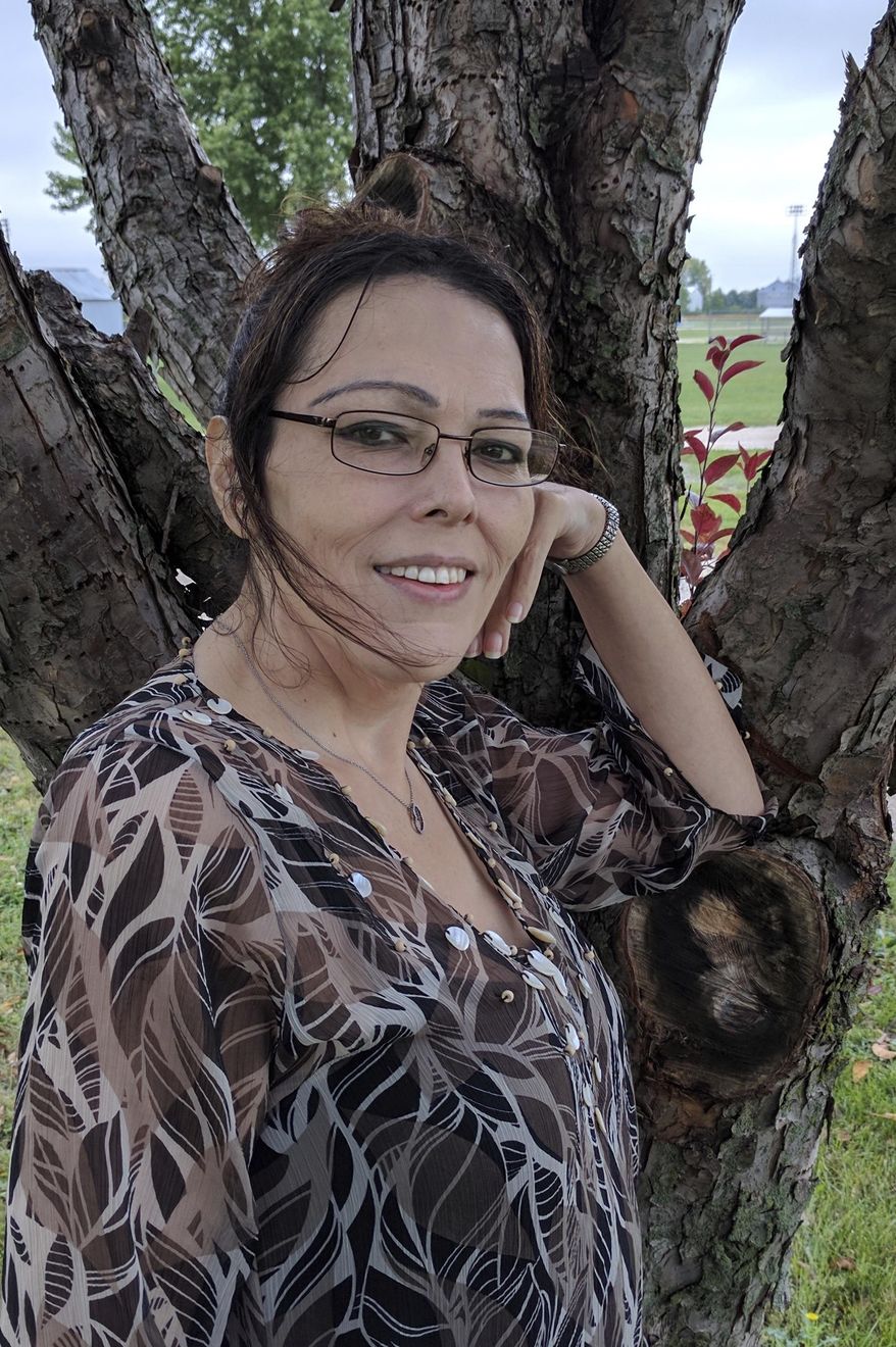 This undated photo provided by ACLU of Iowa shows Carol Ann Beal. The Iowa Supreme Court on Friday, March 8, 2019 upheld a judge’s earlier ruling that found the state cannot deny two transgender women Medicaid coverage for sex reassignment surgery. The ruling comes in the consolidated cases of Beal, 43, and EerieAnna Good, 29,both were born male but have identified as female since childhood and applied to have surgery to their medical providers under the state's Medicaid program. They were denied by the providers, appealed to the state agency, which oversees the program, and were again denied. (ACLU of Iowa via AP)
