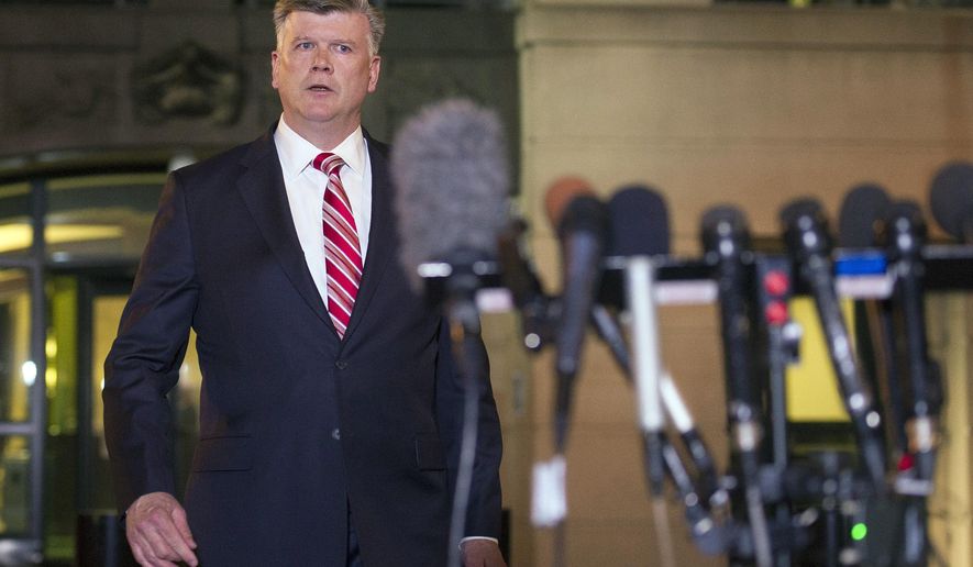 Attorney Kevin Downing walks to the microphones to speak with reporters following the sentencing of his client former Trump campaign chairman Paul Manafort, in Alexandria, Thursday, March 7, 2019. Manafort was sentenced to nearly four years in prison for tax and bank fraud related to his work advising Ukrainian politicians, a significant break from sentencing guidelines that called for a 20-year prison term. (AP Photo/Cliff Owen)