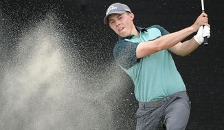 Matthew Fitzpatrick, of England, hits out of a bunker onto the 17th green during the third round of the Arnold Palmer Invitational golf tournament Saturday, March 9, 2019, in Orlando, Fla. (AP Photo/Phelan M. Ebenhack)