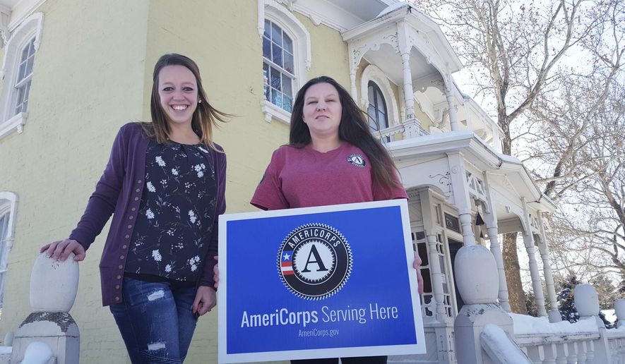 The Fremont Family Coalition's Shayla Linn, left, and AmeriCorps member Beth Vogt, right, are organizing community meetings meant to allow community members struggling with poverty the opportunity to learn about local resources that can help. (James Farrell/The Tribune via AP)