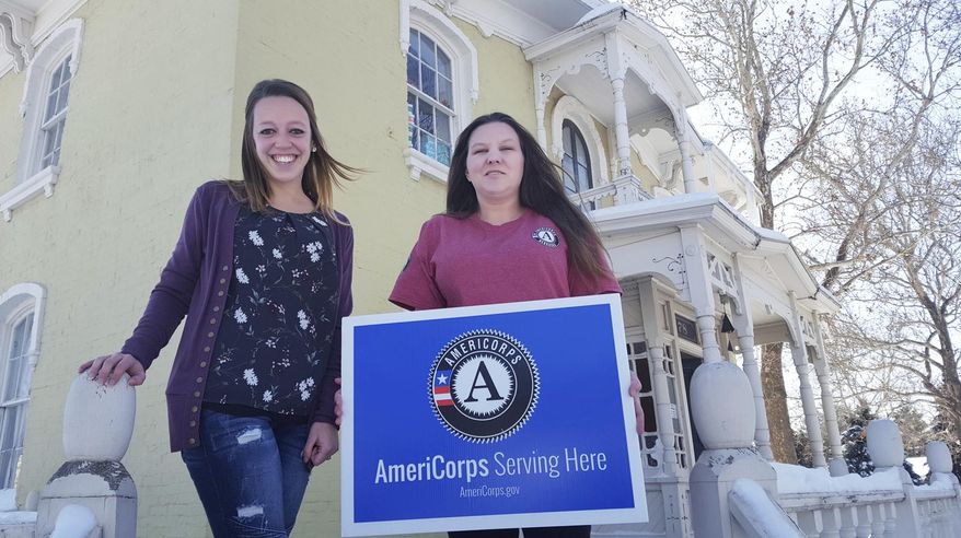 The Fremont Family Coalition's Shayla Linn, left, and AmeriCorps member Beth Vogt, right, are organizing community meetings meant to allow community members struggling with poverty the opportunity to learn about local resources that can help. (James Farrell/The Tribune via AP)