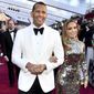 FILE - In this Sunday, Feb. 24, 2019, file photo, Alex Rodriguez, left, and Jennifer Lopez arrive at the Oscars at the Dolby Theatre in Los Angeles. Rodriguez and Lopez are engaged. The couple posted an Instagram photo of their hands with a massive engagement ring on Lopez’s ring finger. (Photo by Charles Sykes/Invision/AP, File)