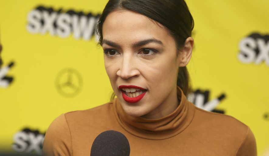Alexandria Ocasio-Cortez arrives for the world premiere of &quot;Knock Down the House&quot; at the Paramount Theatre during the South by Southwest Film Festival on Sunday, March 10, 2019, in Austin, Texas. (Photo by Jack Plunkett/Invision/AP)