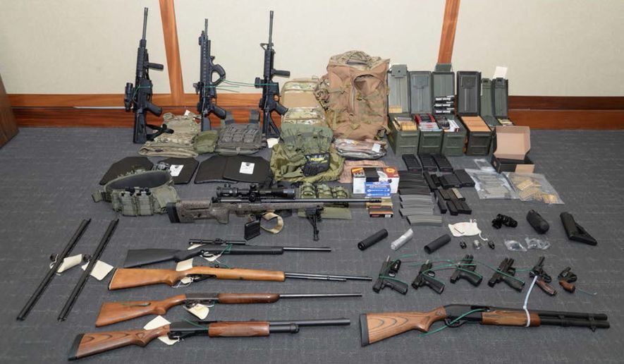 Firearms and ammunition were used in the motion for detention pending trial in the case against Christopher Paul Hasson in U.S. District Court in Maryland. The Coast Guard officer, accused of being a white supremacist who compiled a hit list of prominent Democrats, was indicted last month on firearms and drug charges. (Associated Press/File)