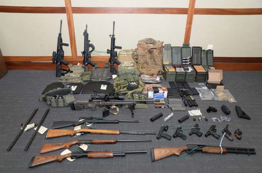 Firearms and ammunition were used in the motion for detention pending trial in the case against Christopher Paul Hasson in U.S. District Court in Maryland. The Coast Guard officer, accused of being a white supremacist who compiled a hit list of prominent Democrats, was indicted last month on firearms and drug charges. (Associated Press/File)
