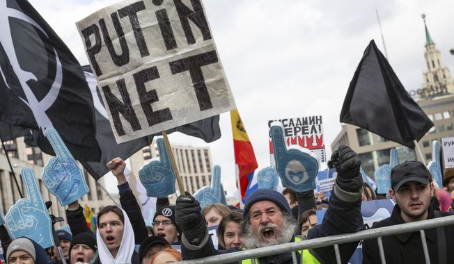 Demonstrators shout during the Free Internet rally in response to a bill making its way through parliament calling for all internet traffic to be routed through servers in Russia — making VPNs (virtual private networks) ineffective, in Moscow, Russia, Sunday, March 10, 2019.Several thousand people have rallied in Moscow to protest legislation that they fear could lead to widespread censorship of the internet for Russian users. (AP Photo/Alexander Zemlianichenko) **FILE**