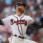 FILE - This is an Oct. 8, 2018, file photo showing Atlanta Braves pitcher Mike Foltynewicz during the first inning in Game 4 of baseball&#39;s National League Division Series against the Los Angeles Dodgers, in Atlanta. The Braves say pitcher Mike Foltynewicz will not be ready for opening day. The right-hander hasn&#39;t been able to pitch during spring training because of discomfort in his elbow caused by bone spurs. While not believed to be a serious issue, Foltynewicz was forced to push back his throwing schedule this spring.(AP Photo/John Bazemore, FIle)