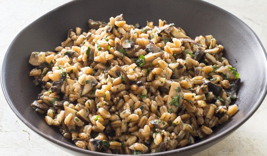 This undated photo provided by America's Test Kitchen in March 2019 shows Warm Farro With Mushrooms. The recipe appears in "The Complete Diabetes Cookbook." (Carl Tremblay/America's Test Kitchen via AP)