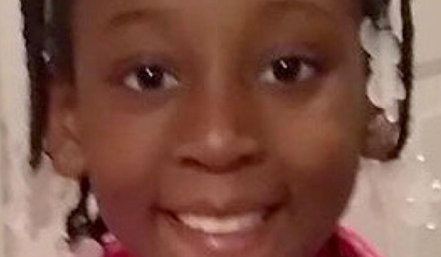 This photo provided by the Los Angeles County Sheriff's Office shows 9-year-old Trinity Love Jones, who was found dead in a duffel bag along a suburban Los Angeles equestrian trail on March 5, 2019. The coroner's office has determined that her death was a homicide. Investigators have detained two people in connection with the case and are seeking help from the public for any additional information. (Los Angeles County Sheriff's Office via AP)