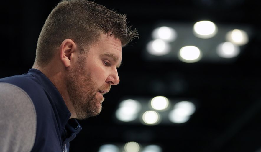 Tennessee Titans general manager Jon Robinson speaks during a press conference at the NFL football scouting combine in Indianapolis, Wednesday, Feb. 27, 2019. (AP Photo/Michael Conroy)
