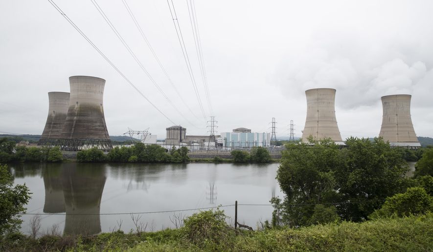 FILE - In this May 22, 2017 file photo shown is the Three Mile Island nuclear power plant in Middletown, Pa. With nuclear power plant owners seeking a rescue in Pennsylvania, a number of state lawmakers are signaling that they are willing to help, with conditions. Giving nuclear power plants what opponents call a bailout could mean a politically risky vote to hike electric bills. (AP Photo/Matt Rourke, File)