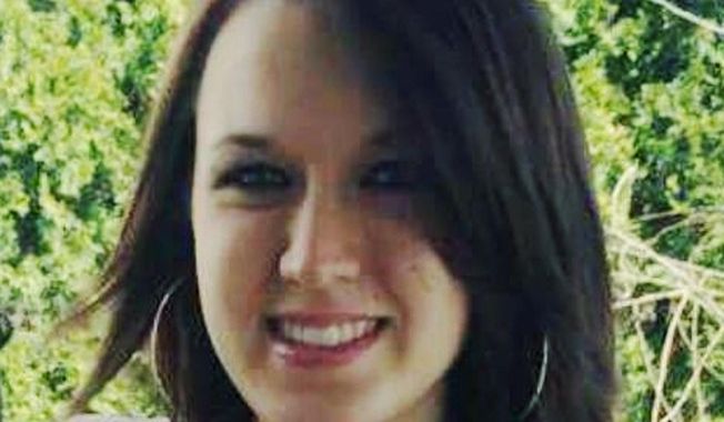 FILE - This undated file photo provided by Michelle Dalton shows her daughter, Donna Castleberry. Columbus vice squad Officer Andrew Mitchell forced women to have sex with him under threat of an arrest, pressured others to help cover up crimes, and lied to federal investigators when he said he'd never had sex with prostitutes, according to charges unveiled Monday, March 11, 2019. Mitchell has also been investigated by state authorities after police said he fatally shot Castleberry, who stabbed him in the hand while sitting in his unmarked police car. (Michelle Dalton via AP, File)