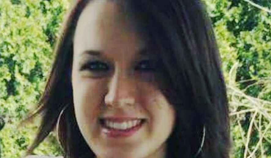 FILE - This undated file photo provided by Michelle Dalton shows her daughter, Donna Castleberry. Columbus vice squad Officer Andrew Mitchell forced women to have sex with him under threat of an arrest, pressured others to help cover up crimes, and lied to federal investigators when he said he'd never had sex with prostitutes, according to charges unveiled Monday, March 11, 2019. Mitchell has also been investigated by state authorities after police said he fatally shot Castleberry, who stabbed him in the hand while sitting in his unmarked police car. (Michelle Dalton via AP, File)