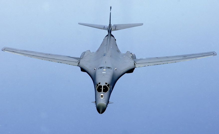 The Rockwell B-1 Lancer is a supersonic variable-sweep wing, heavy bomber used by the United States Air Force. It is commonly called the "Bone" (from "B-One"). The B-1 was first envisioned in the 1960s as a platform that would combine the Mach 2 speed of the B-58 Hustler with the range and payload of the B-52, and would ultimately replace both bombers. After a long series of studies, Rockwell International (now part of Boeing) won the design contest for what emerged as the B-1A. This version had a top speed of Mach 2.2 at high altitude and the capability of flying for long distances at Mach 0.85 at very low altitudes. The combination of the high cost of the aircraft, the introduction of the AGM-86 cruise missile that flew the same basic profile, and early work on the stealth bomber all significantly affected the need for the B-1. This led to the program being canceled in 1977, after the B-1A prototypes had been built. The program was restarted in 1981, largely as an interim measure until the stealth bomber entered service. This led to a redesign as the B-1B, which had lower top speed at high altitude of Mach 1.25, but improved low-altitude performance of Mach 0.96. The electronics were also extensively improved during the redesign, and the airframe was improved to allow takeoff with the maximum possible fuel and weapons load. The B-1B began deliveries in 1986 and formally entered service with Strategic Air Command (SAC) as a nuclear bomber in 1986. By 1988, all 100 aircraft had been delivered. In the early 1990s, following the Gulf War and concurrent with the disestablishment of SAC and its reassignment to the newly formed Air Combat Command, the B-1B was converted to conventional bombing use. It first served in combat during Operation Desert Fox in 1998 and again during the NATO action in Kosovo the following year. The B-1B has supported U.S. and NATO military forces in Afghanistan and Iraq. The Air Force had 66 B-1Bs in service as of September 2012. The B-1B is ex