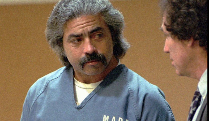 EMBARGO HOLD FOR RELEASE FOR PUBLICATION ON WEDNESDAY, MAR. 13, AND THEREAFTER - FILE - This Dec. 7, 1993 file photo shows Richard Allen Davis appearing with his public defender, Bruce Kinnison, in a Sonoma County Municipal Court in Santa Rosa, Calif. Now 64, Davis has been on death row at San Quentin State Prison since his 1996 conviction in the kidnap-murder of 12-year-old Polly Klaas of Petaluma, Calif. Gov. Gavin Newsom is expected to sign a moratorium on the death penalty in California, Wednesday, March 13, 2019. (AP Photo/Paul Sakuma, File)