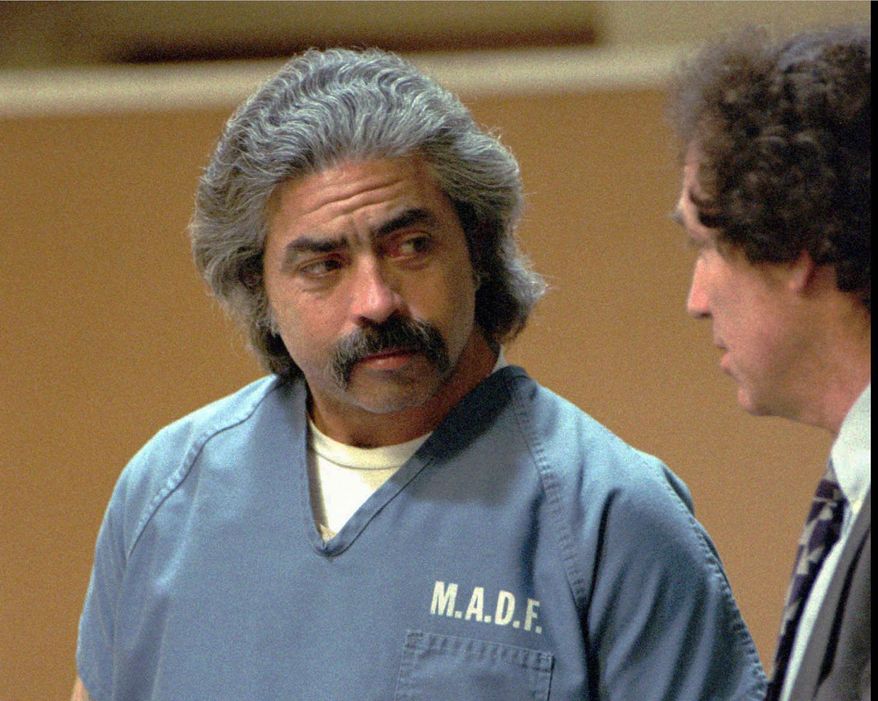 EMBARGO HOLD FOR RELEASE FOR PUBLICATION ON WEDNESDAY, MAR. 13, AND THEREAFTER - FILE - This Dec. 7, 1993 file photo shows Richard Allen Davis appearing with his public defender, Bruce Kinnison, in a Sonoma County Municipal Court in Santa Rosa, Calif. Now 64, Davis has been on death row at San Quentin State Prison since his 1996 conviction in the kidnap-murder of 12-year-old Polly Klaas of Petaluma, Calif. Gov. Gavin Newsom is expected to sign a moratorium on the death penalty in California, Wednesday, March 13, 2019. (AP Photo/Paul Sakuma, File)