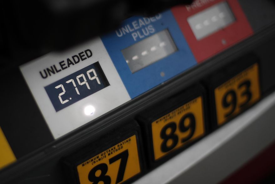 FILE- This Nov. 16, 2018, file photo shows gas prices at a pump in West Mifflin, Pa. On Tuesday, March 12, 2019, the Labor Department reports on U.S. consumer prices for February. (AP Photo/Gene J. Puskar, File)