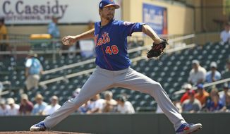 New York Mets pitcher Jacob deGrom (48) pitches during the first inning of a spring training baseball game against the Miami Marlins, Tuesday, March 12, 2019 in Jupiter, Fla. (David Santiago/Miami Herald via AP)