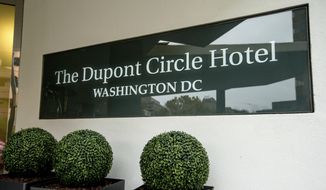 In this Nov. 7, 2015, file photo, the Dupont Circle Hotel in Washington where Mikhail Lesin, a former aide to Russian President Vladimir Putin, was found dead on Nov. 5, 2015. The Washington Medical Examiner’s office is debating whether to appeal a judge’s order to release all files relating to the 2015 death of Lesin in a Washington hotel room. (AP Photo/Andrew Harnik, File)