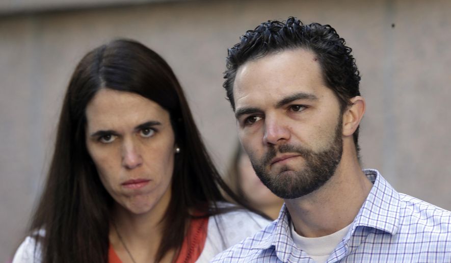 FILE - This March 31, 2016, file photo shows Rusty and Summer Page, foster parents of Lexi, a then-6-year-old girl with Native American ancestry, who was removed from their home, outside the California Court of Appeal in downtown Los Angeles. Lexi ultimately was placed with her father's extended family in Utah. A federal law that gives preference to Native American families in child welfare proceedings involving Native children is facing a significant legal challenge. (AP Photo/Nick Ut, File)