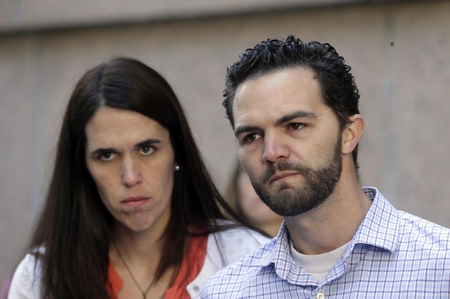 FILE - This March 31, 2016, file photo shows Rusty and Summer Page, foster parents of Lexi, a then-6-year-old girl with Native American ancestry, who was removed from their home, outside the California Court of Appeal in downtown Los Angeles. Lexi ultimately was placed with her father's extended family in Utah. A federal law that gives preference to Native American families in child welfare proceedings involving Native children is facing a significant legal challenge. (AP Photo/Nick Ut, File)