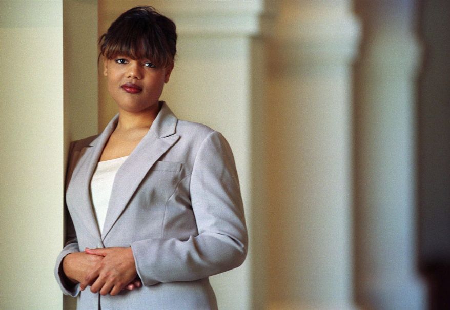 FILE - In this Feb. 10, 2000, file photo, Freeda Foreman stands in The Regent Las Vegas Hotel and Casino in Las Vegas, following a press conference announcing her professional boxing debut. The 42-year-old daughter of former heavyweight champion George Foreman died at a Houston-area home. The Harris County sheriff's office said deputies were called Friday, March 8, 2019, to the home where EMS had determined Freeda George Foreman was dead. (AP Photo/Laura Rauch, File)