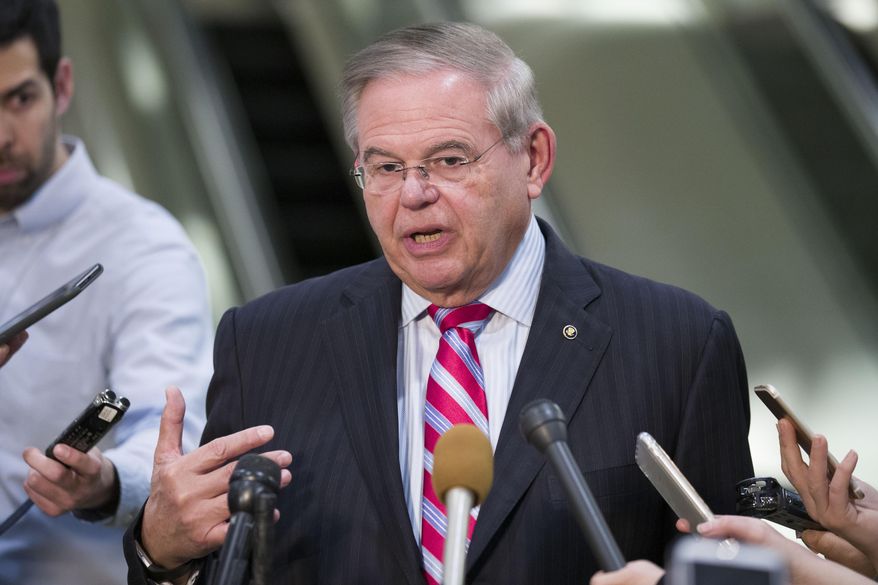 Senate Foreign Relations Committee ranking member Sen. Bob Menendez, D-N.J., speaks with the media after a closed-door briefing for the members of the Senate Foreign Relations Committee, Tuesday, March 5, 2019, in Washington. (AP Photo/Alex Brandon) **FILE**