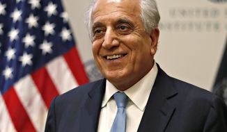 FILE - In this Feb. 8, 2019, file photo, Special Representative for Afghanistan Reconciliation Zalmay Khalilzad at the U.S. Institute of Peace, in Washington. The longest direct talks ever held between the United States and the Taliban concluded this week with both sides citing progress toward ending the 17-year war, but many questions remain unanswered. Khalilzad said they reached two “draft agreements” covering the withdrawal of U.S. troops and guarantees that Afghanistan would not revert to a haven for terrorists. (AP Photo/Jacquelyn Martin, File)