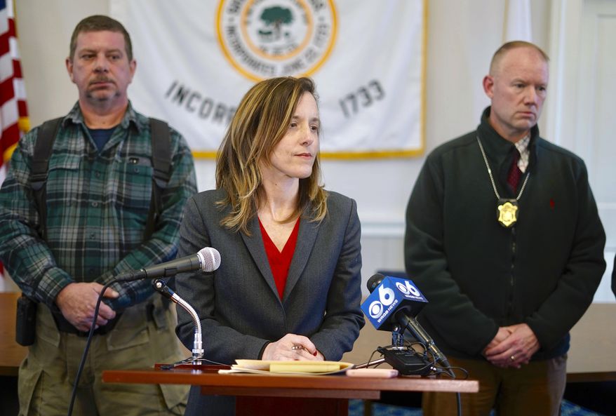 District Attorney Andrea Harrington, center, speaks during a news conference Wednesday, March 13, 2019, at Sheffield Town Hall about a house fire on Home Road that took the lives of five people in Sheffield, Mass. Behind Harrington are Sheffield Fire Chief Brent Getchell, left, and Massachusetts State Police Lt. Detective Ed Culver. (Ben Garver/The Berkshire Eagle via AP)