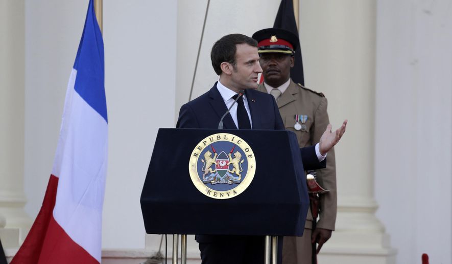 France's President Emmanuel Macron speaks during a press conference with Kenya's President Uhuru Kenyatta at State House in Nairobi, Kenya Wednesday, March 13, 2019. Macron is visiting Kenya Wednesday, after stops in Ethiopia and Djibouti on Tuesday, as part of his latest Africa visit aimed at shoring up military and economic ties in an increasingly strategic region. (AP Photo/Khalil Senosi)