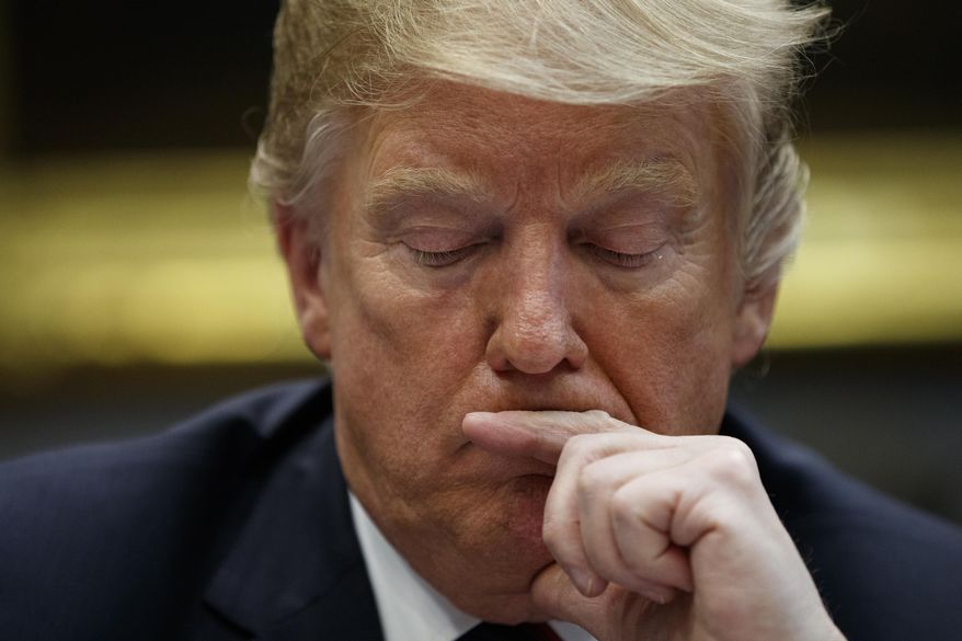 President Donald Trump listens during a briefing on drug trafficking at the southern border in the Roosevelt Room of the White House, Wednesday, March 13, 2019, in Washington. Trump said during the event the U.S. is issuing an emergency order grounding all Boeing 737 Max 8 and Max 9 aircraft "effective immediately," in the wake of the crash of an Ethiopian Airliner that killed 157 people. (AP Photo/ Evan Vucci)