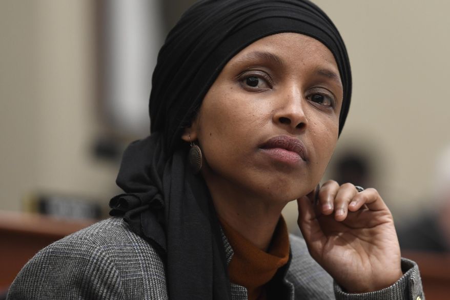 Rep. Ilhan Omar, D-Minn., listens as Office of Management and Budget Acting Director Russ Vought testifies before the House Budget Committee on Capitol Hill in Washington, March 12, 2019. Debate in Congress over Israel and anti-Semitism is providing President Donald Trump an opening to appeal to Jewish American voters (AP Photo/Susan Walsh) ** FILE **