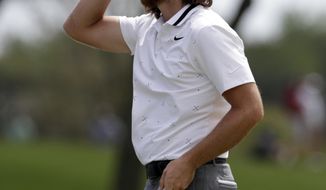 Tommy Fleetwood reacts to his putt on the ninth hole during the first round of The Players Championship golf tournament Thursday, March 14, 2019, in Ponte Vedra Beach, Fla. (AP Photo/Lynne Sladky)