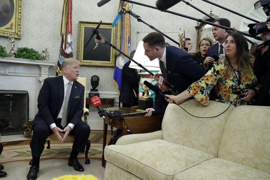 President Donald Trump meets with Irish Prime Minister Leo Varadkar in the Oval Office of the White House, Thursday, March 14, 2019, in Washington. (AP Photo/ Evan Vucci)
