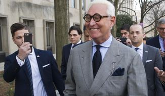 Roger Stone, an associate of President Donald Trump, leaves the U.S. District Court. (AP Photo/Cliff Owen)
