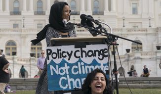 Rep. Ilhan Omar, D-Minn. speaks at the International Youth Climate Strike event at the Capitol in Washington, Friday, March 15, 2019. (AP Photo/J. Scott Applewhite)