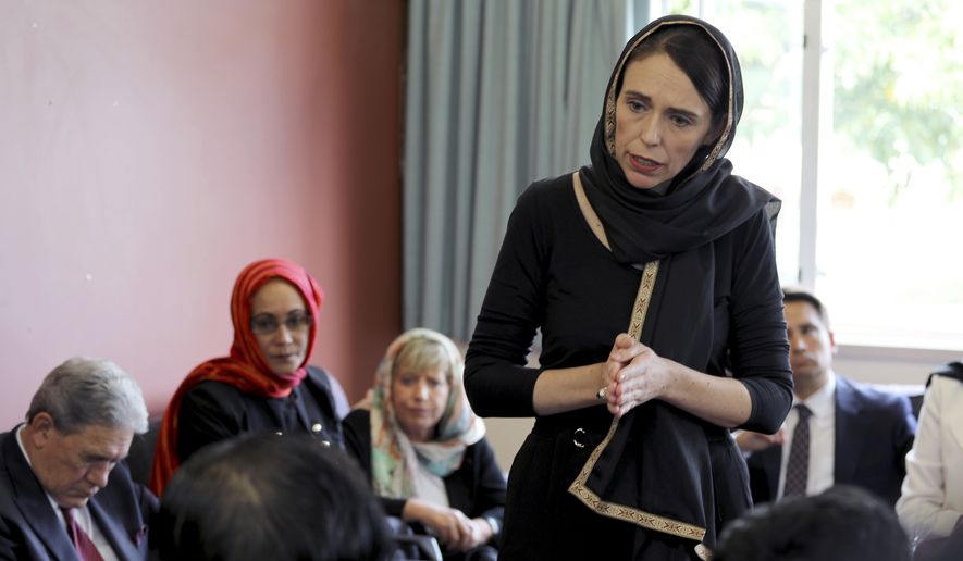 In this photo released by New Zealand Prime Minister&#39;s Office, Prime Minister Jacinda Ardern speaks to representatives of the Muslim community, Saturday, March 16, 2019 at the Canterbury Refugee Centre in Christchurch, New Zealand, a day after the mass shootings at two mosques in the city. (New Zealand Prime Minister Office via AP)