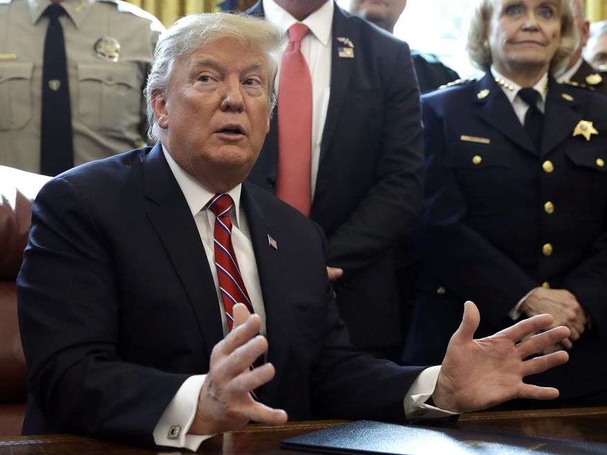 President Donald Trump speaks about border security in the Oval Office of the White House, Friday, March 15, 2019, in Washington. Trump issued the first veto of his presidency, overruling Congress to protect his emergency declaration for border wall funding. (AP Photo/Evan Vucci)