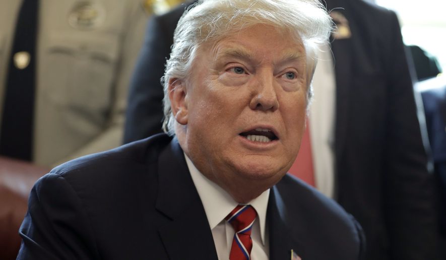 President Donald Trump speaks about border security in the Oval Office of the White House, Friday, March 15, 2019, in Washington. (AP Photo/Evan Vucci)