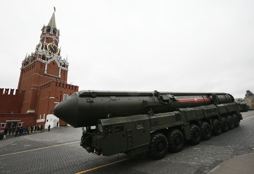 FILE - In this Tuesday, May 9, 2017 file photo, Russian Topol M intercontinental ballistic missile launcher rolls along Red Square during the Victory Day military parade to celebrate 72 years since the end of WWII and the defeat of Nazi Germany, in Moscow, Russia. (AP Photo/Alexander Zemlianichenko, File)