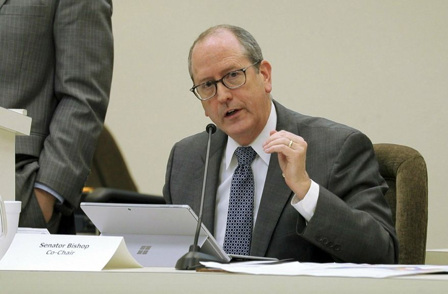 FILE - In this Jan. 22, 2018 file photo, N.C. Sen. Dan Bishop speaks during a joint N.C. House-Senate committee meeting on judicial reform and redistricting held at the Legislative Office Building in downtown Raleigh, N.C. Bishop of Charlotte filed on Thursday, March 14, 2019 to run in the 9th Congressional District re-do election. He faces at least two others in May's Republican primary. (Chris Seward/The News & Observer via AP)