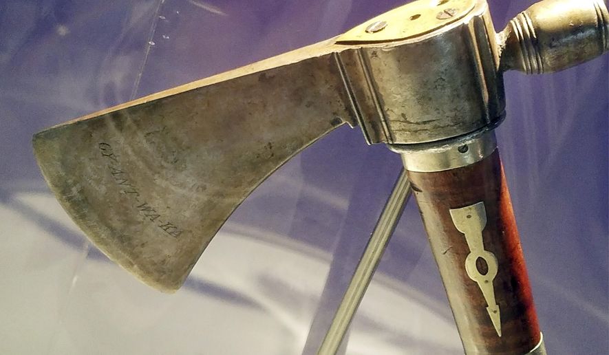 This photo March 15, 2019, photo provided by Seneca-Iroquois National Museum in New York shows a long-missing peace pipe tomahawk President George Washington gave to Seneca Indian leader Cornplanter in the late 18th century that has been returned to the tribe in western New York. An anonymous collector returned the artifact to the museum and officials there decided to give it back to the Senecas. (Philip J. Pantano/Seneca-Iroquois National Museum via AP)