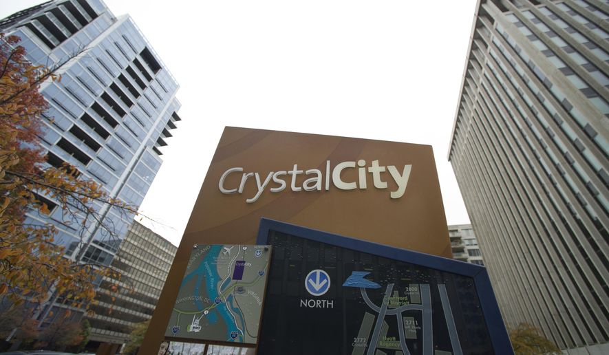 This Nov. 13, 2018, file photo shows a sign of a street map for Crystal City neighborhood of Arlington, Va. Protesters repeatedly shouted &amp;quot;shame&amp;quot; as a northern Virginia county board Saturday unanimously approved a $23 million incentives package for Amazon to build a new headquarters there. (AP Photo/Cliff Owen, File)