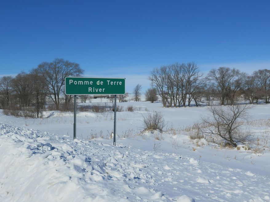 In a Feb. 28, 2019 photo, The Pomme de Terre River flows through the city of Morris, Minn. The city's wastewater treatment plant is discharging too much chloride into the river, largely due to water softeners. (Kirsti Marohn/Minnesota Public Radio via AP)