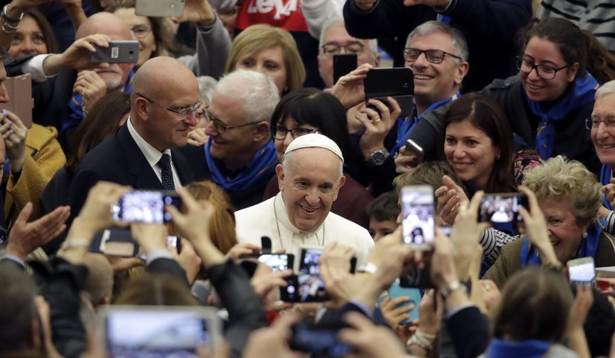 Pope Francis arrives for a audience with members of the confederation of the Italian cooperatives in the Paul VI Hall at the Vatican, Saturday, March 16, 2019. (AP Photo/Alessandra Tarantino, )