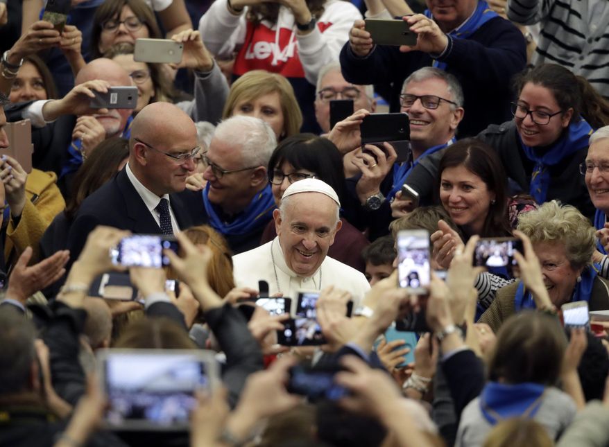 Pope Francis arrives for a audience with members of the confederation of the Italian cooperatives in the Paul VI Hall at the Vatican, Saturday, March 16, 2019. (AP Photo/Alessandra Tarantino, )